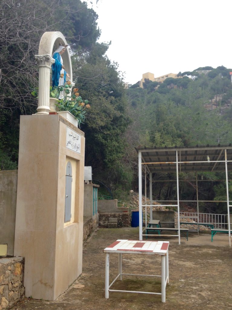 Outdoor altar and shrine for the Virgin Mary, hidden in the woods